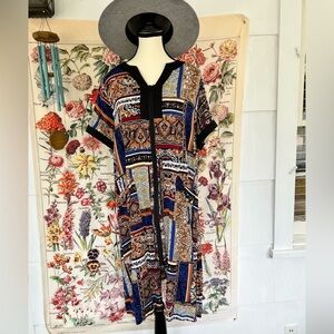 Yozly size M women’s housedress. This has a beautiful paisley print. Gorgeous.